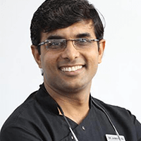 Dr. Jamim Patel - Dental implant dentist, Ahmedabad