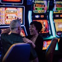 Old Asian couple in a casino