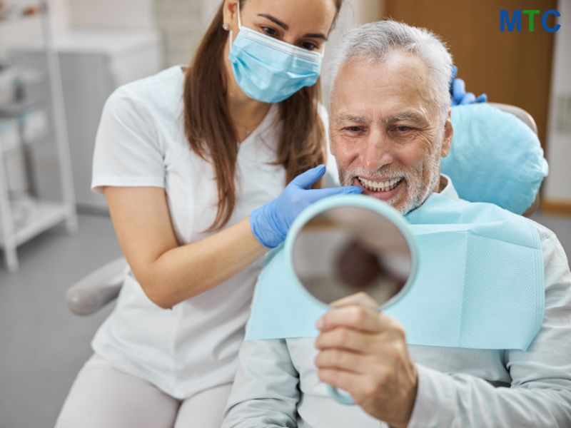 Old patient with dentist