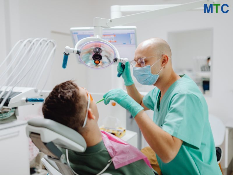 Dentist with patient | Mexico, near Yuma, Arizona